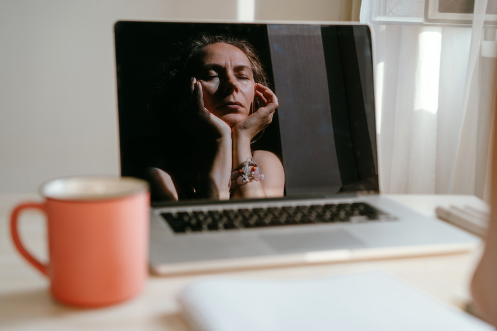 Woman looking at computer 