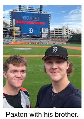 Paxton with his brother on Comerica Park field.